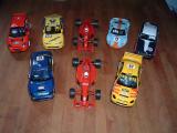 8 Scalextric cars ready to race.