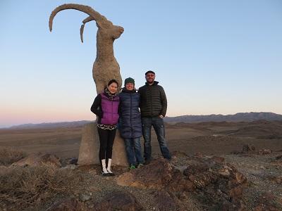 Doogie, Alex and Mike in front of Ibex statue above Kahn Bogd Tourist Camp