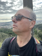 a photograph Mike Harris with Barcelona in the background